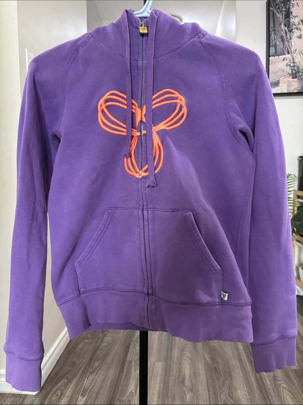 TNA Purple Zip-Up Hoodie with Orange Embroidered Accent